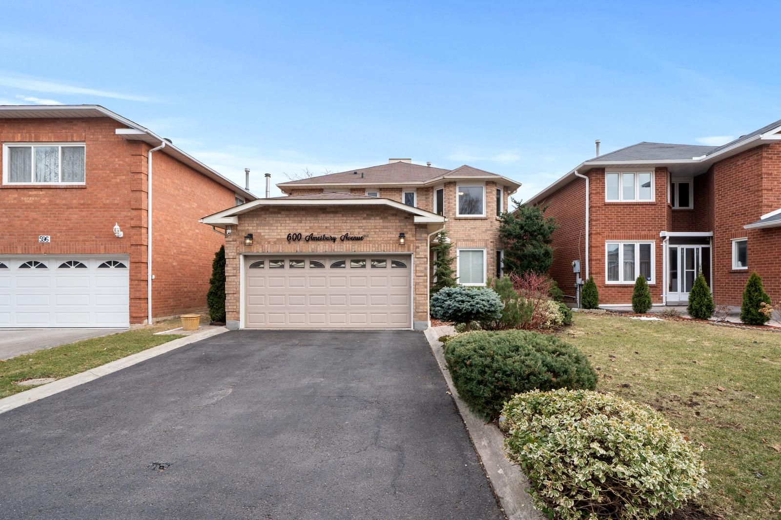 Welcome to 600 Amesbury Ave, a beautifully maintained 4-bedroom, 4-bathroom home in the sought-after Woodland Park community of Mississauga. This stunning property has been lovingly cared for by its original owners, showcasing pride of ownership and meticulous upkeep. Step inside to discover a spacious and functional layout designed for family living. The main floor offers an inviting atmosphere with bright and airy living spaces, perfect for both everyday comfort and entertaining. The large kitchen features potlights, stainless steel appliances and a cozy breakfast area, seamlessly flowing into the family room for an open and connected feel. Upstairs, you'll find generously sized bedrooms, each offering comfort and privacy. The impressive primary suite serves as a true retreat, complete with a walk-in closet and a 5-piece ensuite featuring a soaking tub, separate shower, and dual vanity. The finished basement extends the living space, offering a versatile area with a dedicated workshop, a rec room and a bar area perfect for hosting guests or unwinding after a long day. Outside, the backyard is an extension of your living space, featuring a natural gas BBQ hookup for seamless outdoor cooking and entertaining. Enjoy summer gatherings and quiet evenings in this private outdoor retreat. Whether you're crafting, working on projects, or enjoying a casual evening with friends, this space provides endless possibilities. Situated in an unbeatable location, this home is just moments from schools, parks, shopping, dining, and major highways, ensuring easy access to everything you need. With its combination of space, functionality, and a prime location, 600 Amesbury Ave is a rare find and an incredible opportunity to call Woodland Park home. Don't miss your chance to own this well-loved, move-in-ready home.