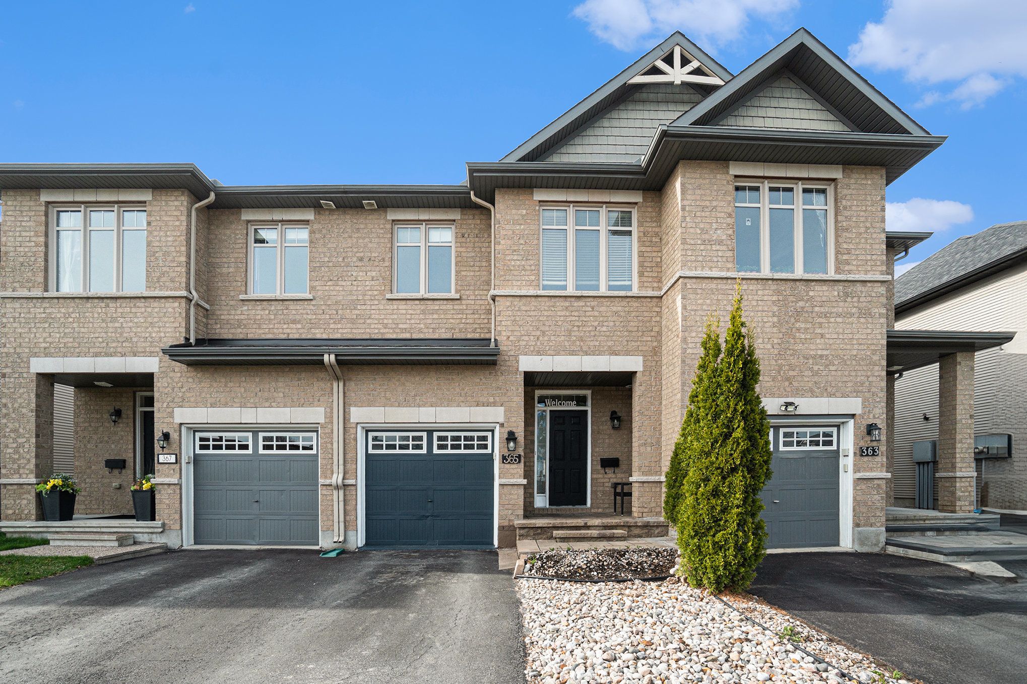 365 Trailsedge Way Orleans - Convent Glen and Area, Ontario Welcome to 365 Trailsedge Way! This well maintained 3 bedroom/2.5 bathroom energy efficient Richcraft 'Highland' townhome is situated in a quiet neighbourhood with no front neighbours and private backyard with patio stones . Main level offers immaculate maple hardwood throughout, open concept living and dining room with cathedral ceiling, upgraded kitchen with island and Quartz counter tops, extended cabinetry and stainless steel appliances with Gas Range Stove included. 2nd level includes spacious master bedroom with updated 3 piece ensuite and walk-in closet. 2 generous sized bedrooms. Fully finished basement equipped with pot lights, gas fireplace, washer/dryer included and plenty of storage space. Generous sized rear yard! Central vac rough in. Access to nature trails, bicycle paths and nearby parks. Close to recreation, shopping, schools and so much more! This one checks all the boxes - space, upgrades, location, and style. Dont miss it! *Some photos are virtually staged*
