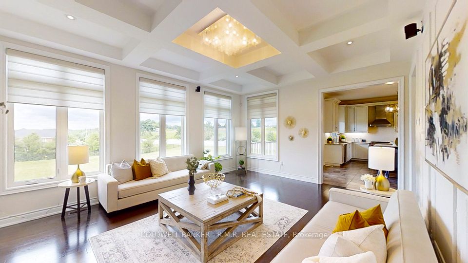 Family Room With Large Windows & Waffle Ceilings
