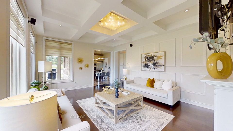 Family Room With Large Windows & Waffle Ceilings