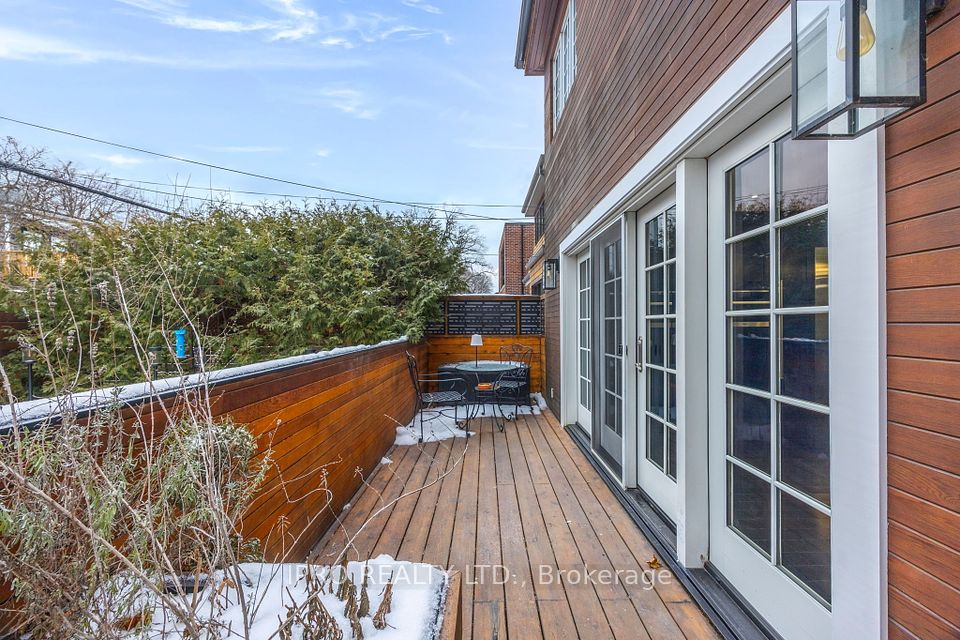 Rear Deck off kitchen - wall to wall french doors