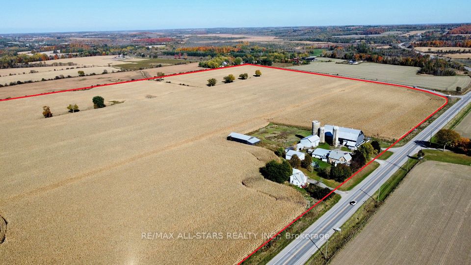 view of entire property Including both homes