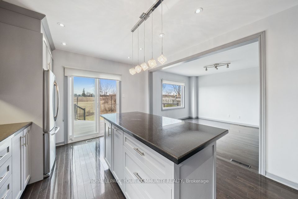 Open concept with walkout to patio
