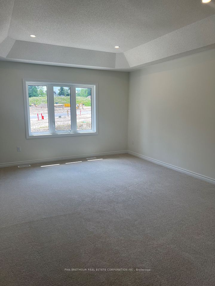 Primary Bedroom with His and Hers Walk-in closets