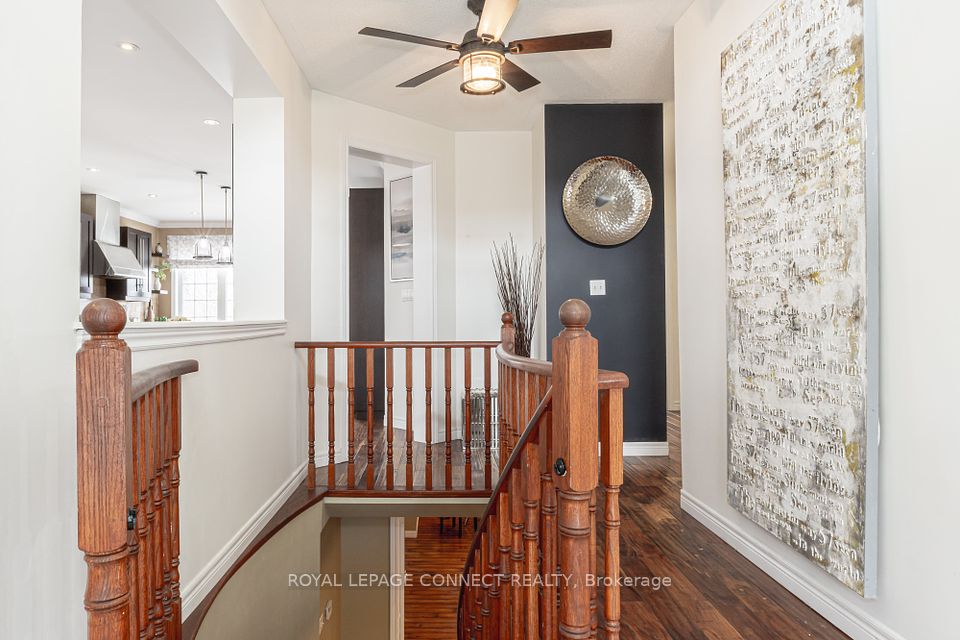 Front foyer with 18 ft soaring ceiling ceiling fan