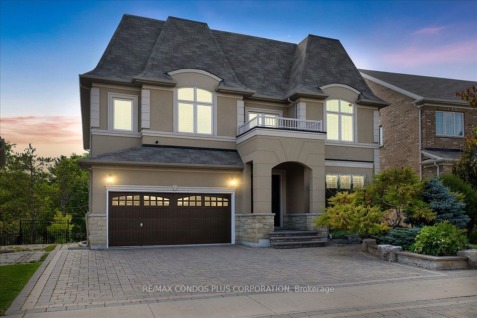 3-car garage and 4 driveway parking spaces