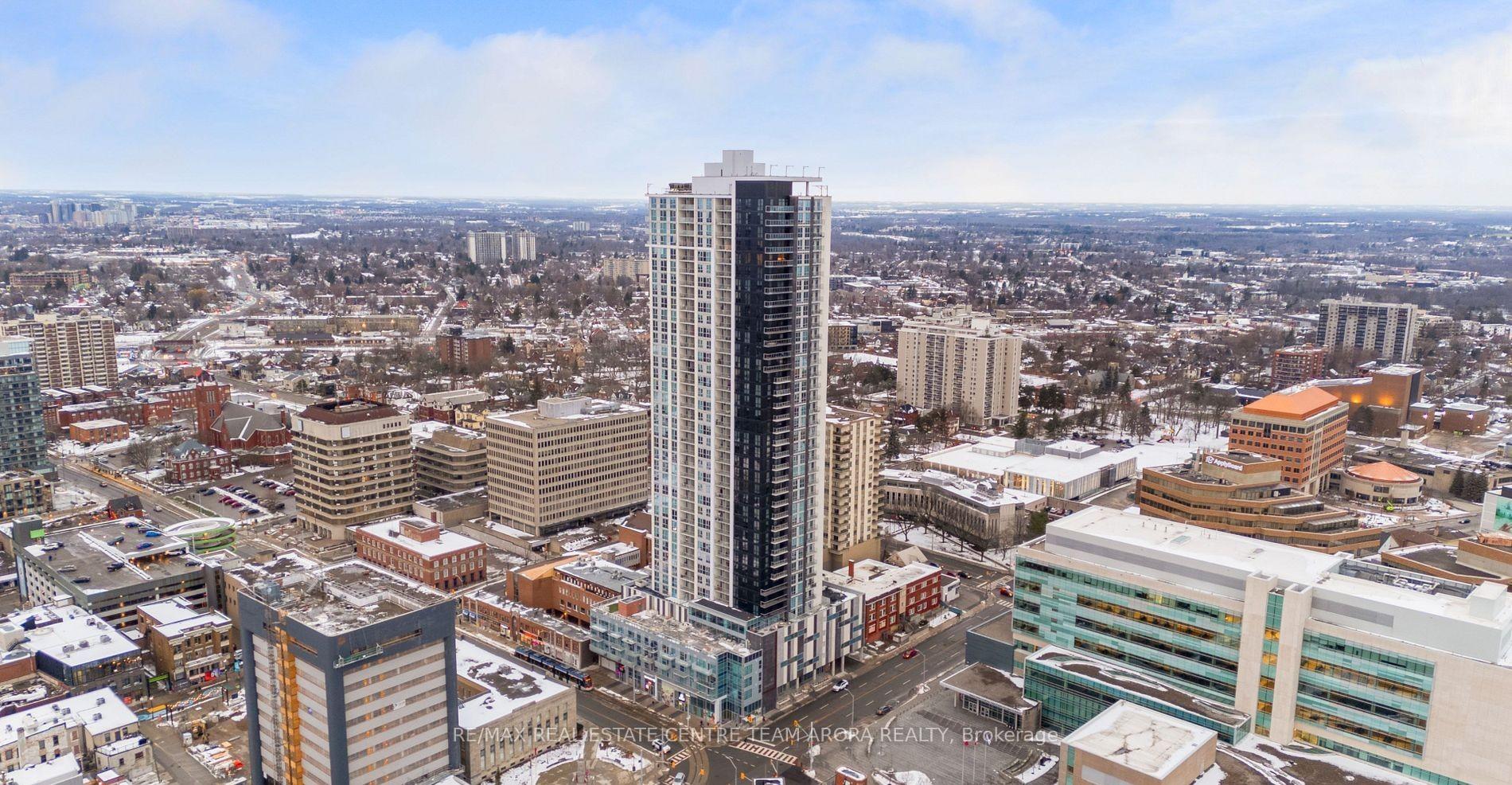 60 Frederick Street 3514 Kitchener, Ontario Wow Must See this luxury living in the heart of the city! offering breathtaking panoramic views (35th floor like Penthouse) and unbeatable location! This luxury unit have 2 bedrooms, 2 full bathrooms and a bright open-concept layout with stainless steel appliances. Experience the modern building boast a range of premium amenities: a welcome concierge, secure entry, patio, party room, rooftop terrace, community garden, yoga studio gym, party room for your entertaining needs, dog park, and convenience of intelligent home functions such as smart door lock, thermostat etc. This unit also includes an underground private parking spot. Conveniently located with access to the ION LRT and GRT bus stops at your doorstep and minutes to Conestoga College, GO Station, University of Waterloo, Wilfred Laurier University and many more. Book your showing today, This property is not to be missed.