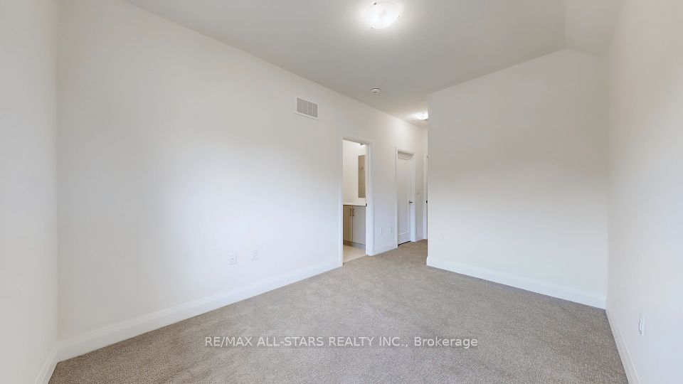 Walk in closets in both upper bedrooms