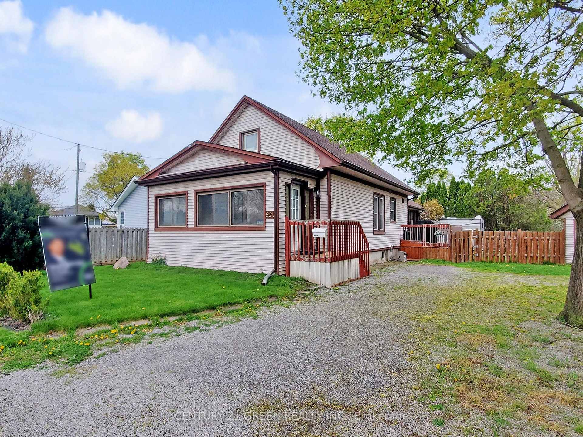 521 CARLTON Street St. Catharines, Ontario Beautifull sunfilled 1 1/2 story detached home in the desirable North End St. Catharines, offers 2 + 1 bedrooms and 2 full baths. Located in an amazing location close to shopping, schools, Churches, Walking trails, and its only 3 min. drive to the QEW. Cozy living room and dining room. Upgrades done since 2022 include kitchen cabinets, dishwasher, range, range hood, RO water filter, washer, dryer, garage roof and electric panel.The home has a bright (Large Windows) and spacious family room that is large enough for all your family and entertaining needs, the perfect place to lounge in front of the gas stove (seperate thermostat) on a cold winter day. The upper level primary suit is the retreat that everyone is searching for with a walk-in closet, 3 piece bath and living area as bonus. The yard is a generous size with ample parking and a shed which may convert to a single garage. Enjoy the outdoors with the deck and a large fully fenced backyard. Spacious basement with bedroom, Rec room and work shop. Within a 15 minute walk you find Kiwanis Aquatic Centre & library, Lester B Pearson Park with play area & splash pad, Welland Canal Trail, Lincoln mall shopping area and many schools. It takes only a 15 minute bike ride to reach the Sunset Beach using the beautiful tree-lined Grantham Trail that borders this property.