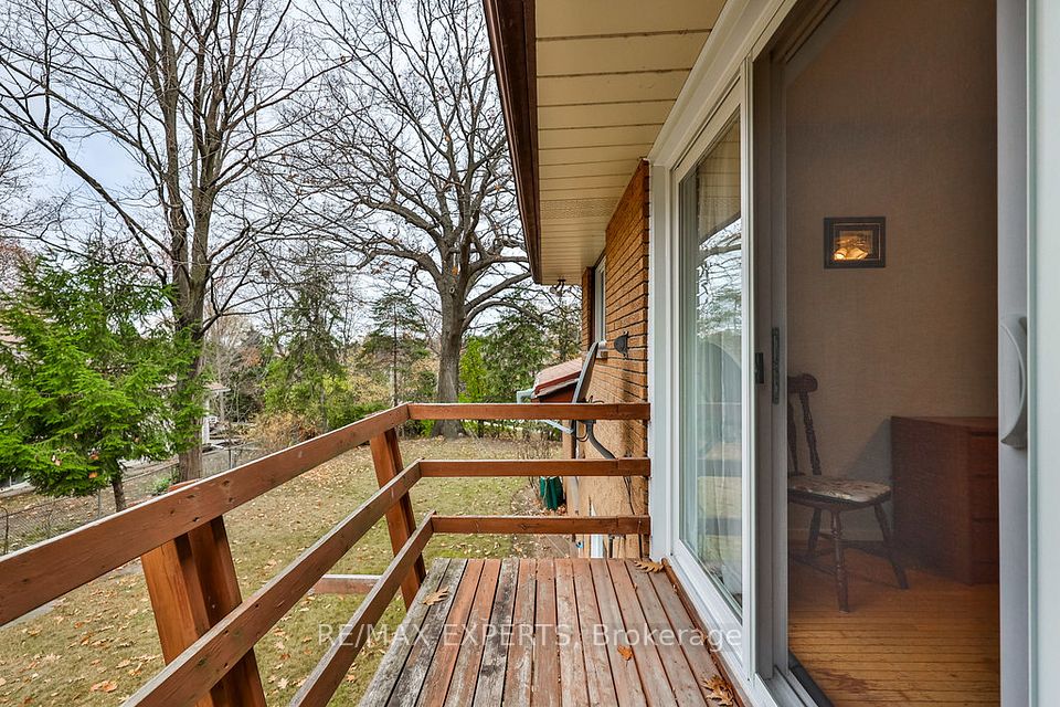 Walkout from primary bdrm to deck overlooking yard