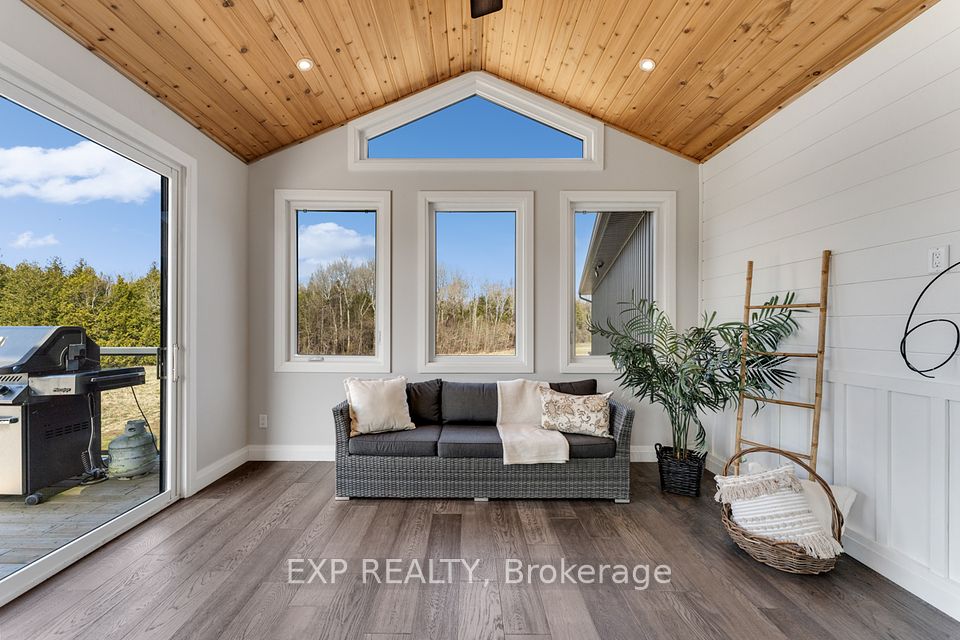 Sunroom With Walk-Out To Deck