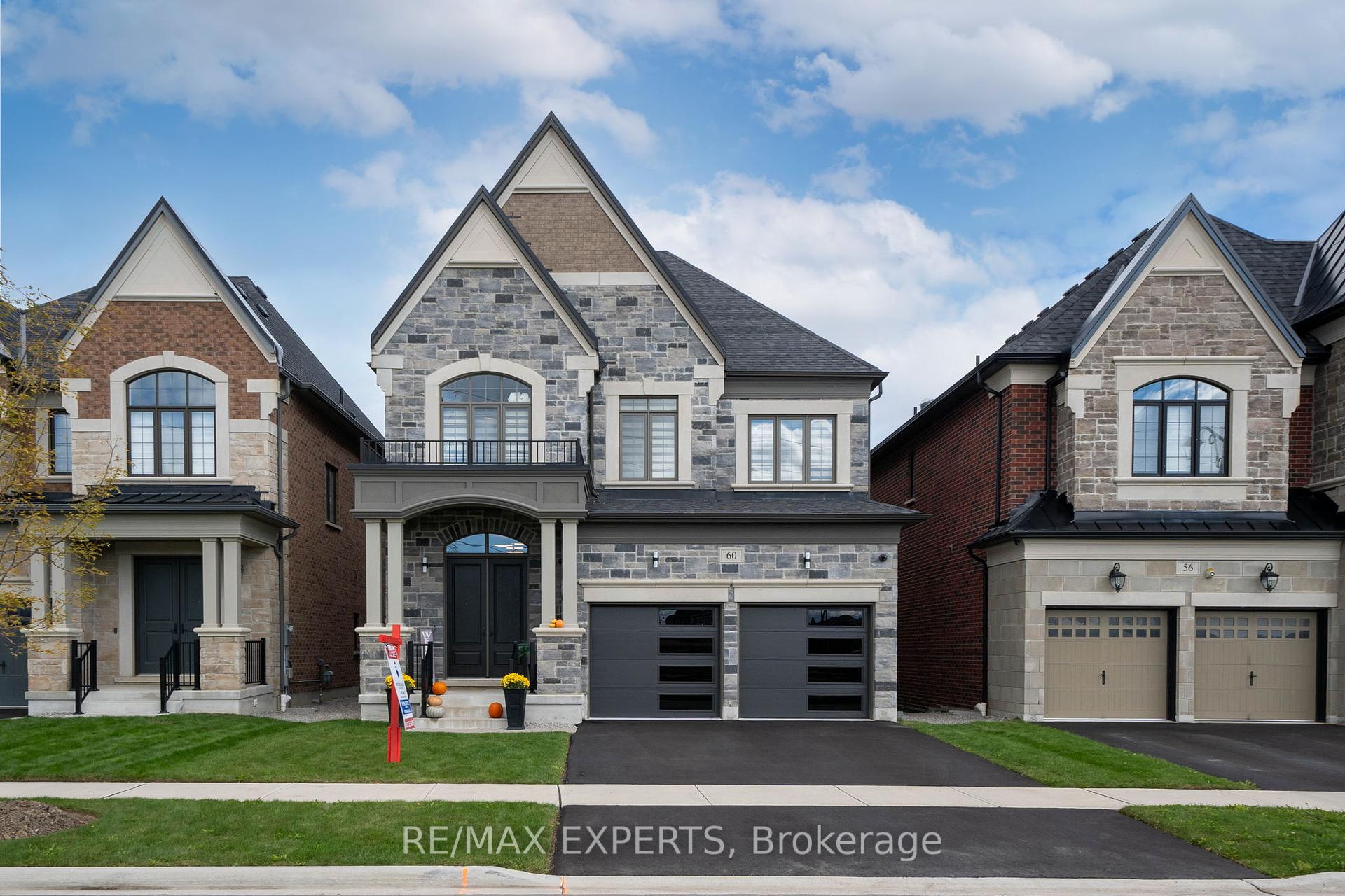 Welcome To Your New Home At 60 Rosshaven Crescent In The Heart Of Woodbridge! Only Three Years Old, This Home Features Over 3,500 Square Feet Of Finished Living Space & Is Luxuriously Upgraded On The Outside & On The Inside! The Exterior Features Brand-New Modern Garage Doors, Upgraded Light Fixtures, Upgraded Stone Facade, Upgraded Entry Doors & Security Cameras. As You Enter The Home, You Are Met With A Grand Foyer W/ A Large Closet & An Upgraded Powder Room. Features Include Smooth Ceilings Throughout, 10 Ft. Ceilings On The Main Floor With Nine (9) Feet On The Second Floor, Built-In Speaker System, Upgraded Tiles Throughout, Upgraded Hardwood Floors Throughout, Upgraded Light Fixtures, Fully Upgraded Designer Kitchen With A Large Kitchen Island Featuring Waterfall Slabs, Built-In Kitchen Appliances, Custom Kitchen Backsplash, Gas Stove-Top, Built-In Espresso Machine, Undermount Lighting, Matte Black Finishes & More! Equipped With A Formal Dining Room As Well As A Breakfast Area That Seats 10 Persons Comfortably. The Breakfast Area Has Upgraded Coffered Ceilings & The Great Room Has Waffle Ceilings. With Upgraded Designer Light Fixtures & Pot Lights Located Throughout, This Home Is Well Lit. The Basement Is A Lookout & As Such, It Has Oversized Windows. This Home Comes Equipped With An HRV. Host & Lounge In Your Private, Professionally Finished Garage Featuring A TV, Soundbar, Epoxy Finished Floors & Matte Black Fans. 8 Ft. Doors Throughout, Upgraded Baseboards, Finished Walk-In Closet, Upgraded Bathrooms, Upgraded Laundry Room & Zebra Blinds, Simply Highlight The Luxurious Nature Of This Home. Backyard Is Conveniently Shaped & Fenced On All Sides, Ready For Your Designs. This New Community Is One Of A Kind & Features A Bridge Connecting The Communities & Is Surrounded By Nature. Book Your Private Tour Today!