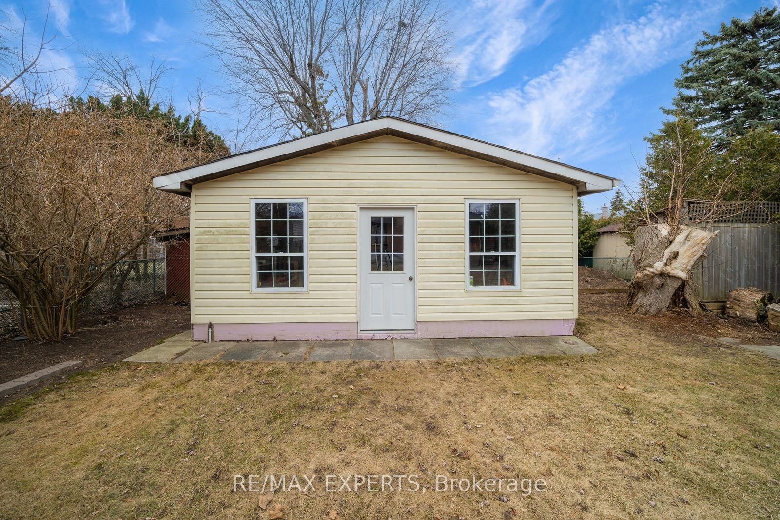 Welcome to this lovely home situated in a highly sought-after Scarborough neighborhood, just minutes from the lake. Offering the perfect blend of comfort and convenience, this home is close to excellent schools, beautiful parks, a variety of restaurants, shopping, major highways, and public transit - making it an ideal choice for families and commuters alike. As you enter, you'll be greeted by a bright and expansive veranda with large windows flooding the space with natural light perfect spot to enjoy your morning coffee or unwind in the evening. The main floor features a generously sized living and dining area, ideal for entertaining family and friends. A cozy family room with a wood-burning fireplace adds warmth and charm, while a patio door leads to a covered deck, seamlessly extending your living space outdoors. The large, level backyard offers endless possibilities for gardening, outdoor activities, or future projects. A convenient three-piece bathroom completes the main floor. Upstairs, you'll find three spacious bedrooms, each offering comfort and ample storage. The primary bedroom features direct access to a four-piece bathroom, which is also accessible from the hallway. A highlight of this room is the large patio door leading to a potential balcony - ready to be finished to your liking. The fully finished basement adds incredible value to this home, featuring a separate entrance, a second kitchen, a living room, a bedroom, and a full bathroom - making it an ideal in-law suite or potential rental space. A large cold room provides additional storage. The backyard is a true standout, offering an expansive and level space that can be transformed to suit your vision. A large, well-built shed presents exciting opportunities as a workshop, extra storage, a potential secondary suite, or a stylish he/she shed. It has built-in support for a possible garage door. Additionally, the garage has been modified to allow for extra storage, a feature many will appreciate.