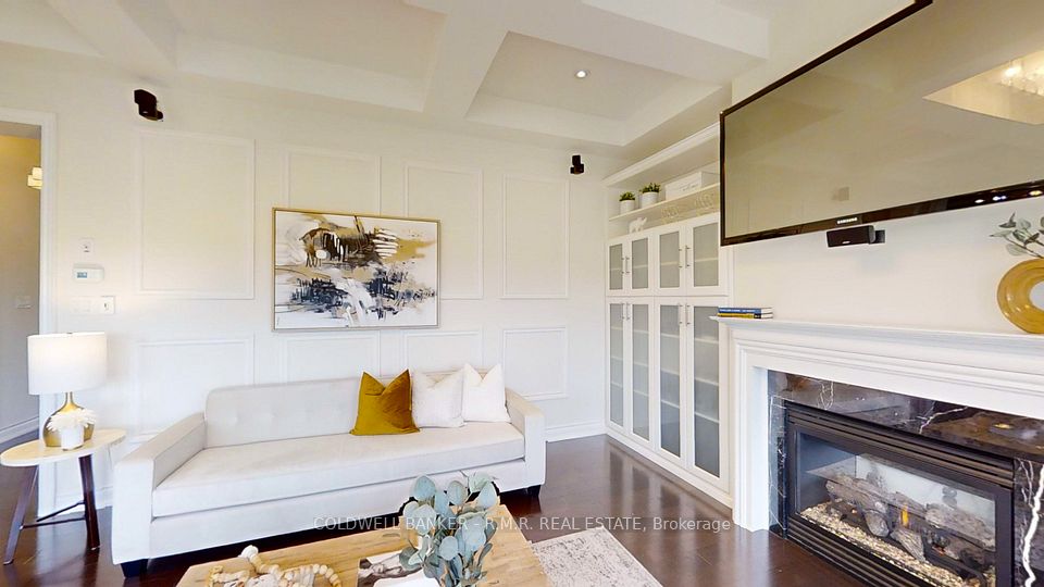 Family Room With Fireplace and Large Windows