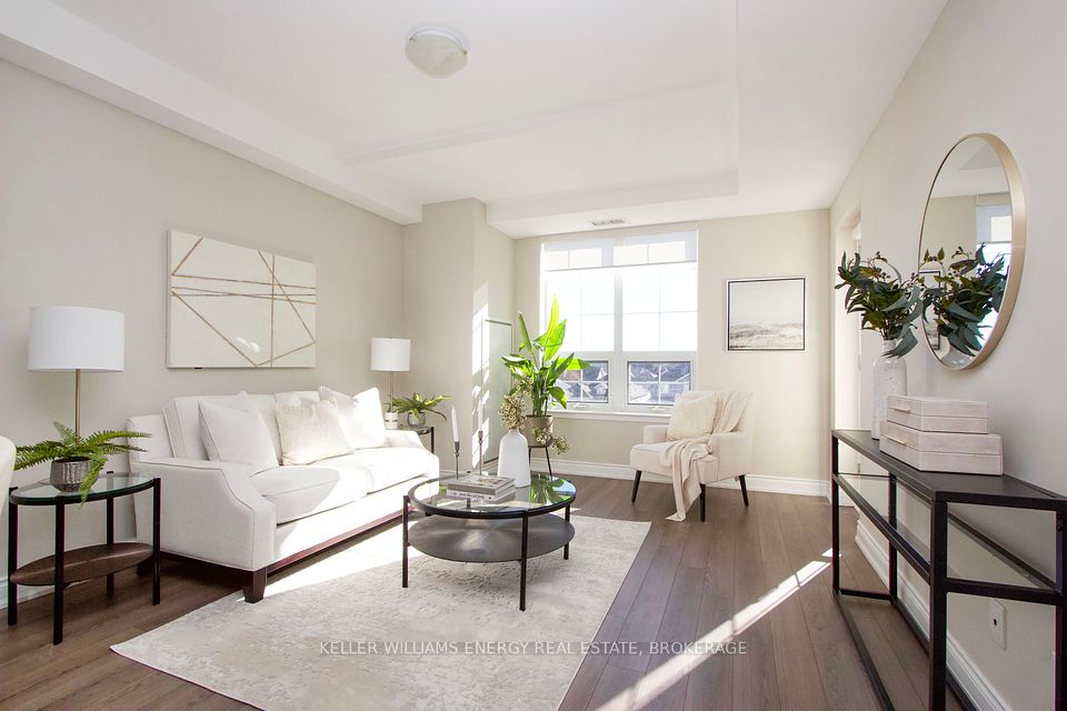 Living room with walk-out to balcony