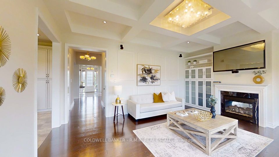 Family Room With Fireplace and Large Windows