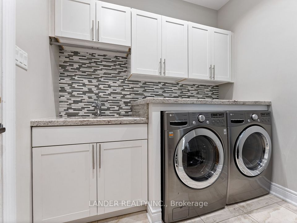 Main Floor Laundry with Granite and Garage Access