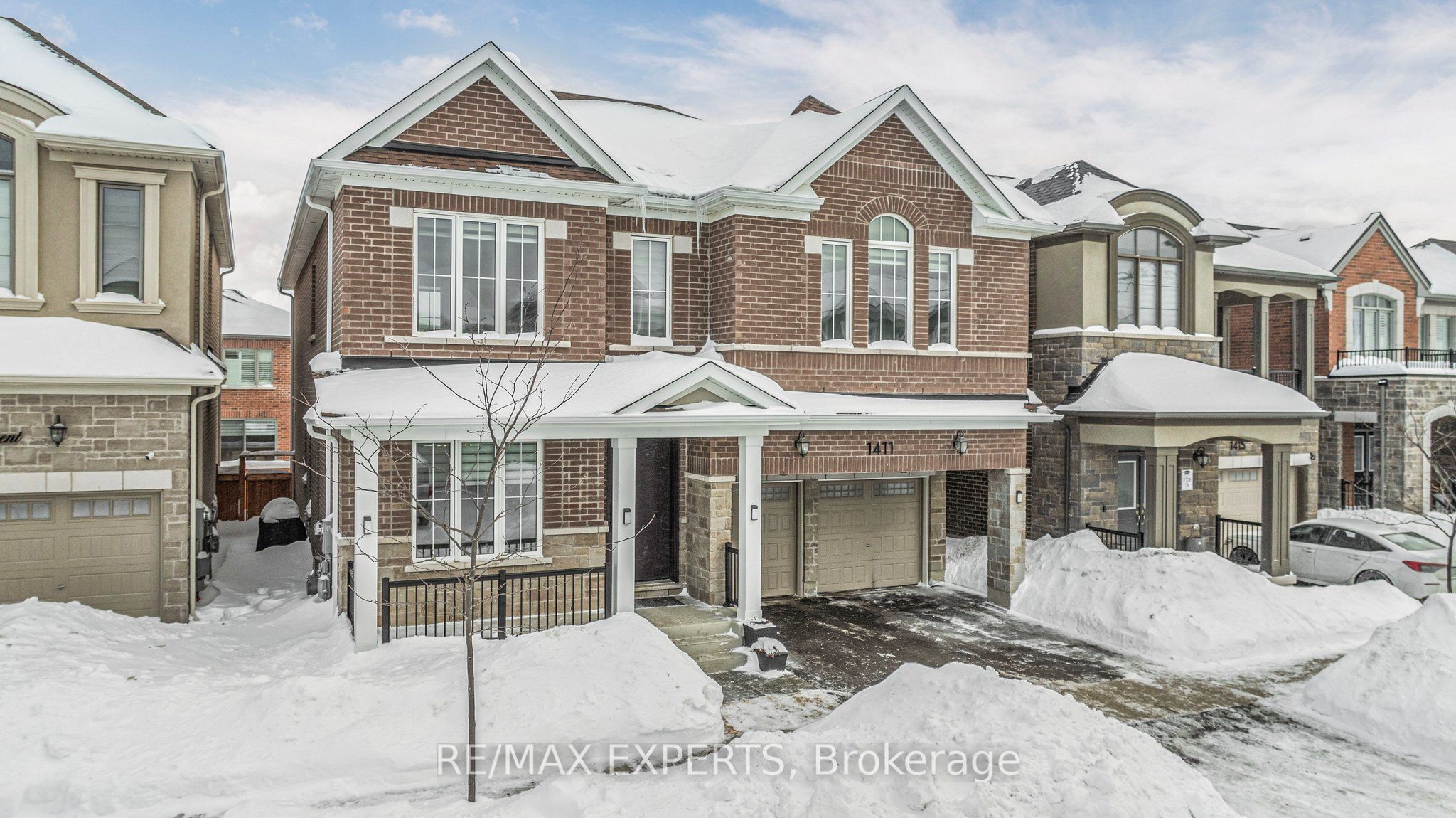 Welcome to modern luxury in this nearly-new, 3-year-old home! Offering over 3400 sq ft of meticulously designed living space above ground, this stunning Home sits on a large 43ft lot and boasts 4+1 bedrooms and 4 bathrooms. A custom 8-foot door welcomes you to a foyer with 24x24 polished porcelain tiles. The bright living room, illuminated by pot lights and a large window, seamlessly flows into the dining room and butler's pantry, creating an ideal setting for hosting gatherings and entertaining. The Grande kitchen is a culinary masterpiece, featuring high-end built-in appliances, including a smart refrigerator, upgraded soft-close cabinetry, and a complementary backsplash. A spacious breakfast area adjacent to the kitchen offers a walk-out to the lush backyard, perfect for enjoying outdoor living. The great room, with its gas fireplace and generous windows, provides a comfortable and inviting space for relaxation and entertainment. The second floor offers four generously sized bedrooms, including a primary suite with an oversized bedroom, his-and-hers closets, and a luxurious five-piece ensuite bathroom. A versatile loft space provides the potential for a fifth bedroom or additional living area. Three additional well-proportioned bedrooms, two full bathrooms, and the convenience of second-floor laundry complete this level, creating an ideal haven for family living. Additionally, the unfinished basement features larger windows and rough-in ready for your vision and creativity to finish the space to your needs. This home has everything for large family living, don't let the miss out on this rare opportunity.
