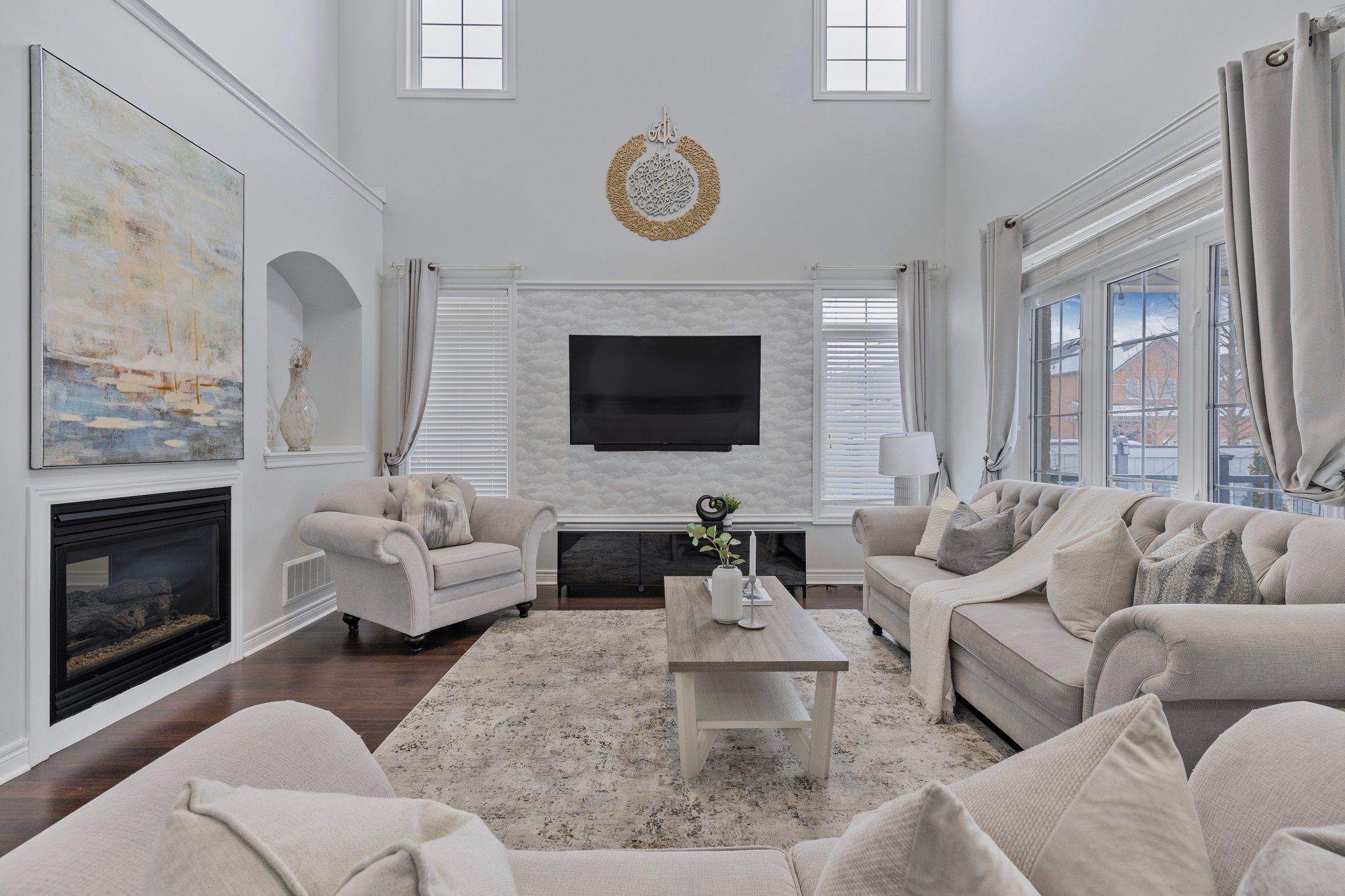 Welcome to luxurious family living on a grand scale! This stunning 4+2 bedroom, 6 bathroom home sits on a sprawling 55 x 100 ft corner lot Bradford's Desired neighbourhood. Boasting 5000+ Sqft  sq ft of living space, this residence offers an abundance of space for both relaxing and entertaining. Be impressed by the dramatic great room with its soaring 20 ft ceilings and a dual-sided fireplace that creates a warm and inviting ambiance. A separate living room provides additional space for relaxation, while a dedicated office is perfect for those who work from home. The formal dining room is ideal for hosting elegant gatherings. The heart of this home is the expansive kitchen, featuring ample counter space, a large breakfast area bathed in natural light from a wall of windows, and a cozy built-in bench. Throughout the home, you'll find elegant touches like pot lights and wainscotting, adding to the sophisticated atmosphere. Second Floor features a grand primary bedroom with an accent wall and duel sided fire place and five piece ensuite. Three other large size bedroom and two full washroom make it perfect for large family living. The finished basement provides even more living space, with a large recreation room, two additional bedrooms, and two washrooms - perfect for guests or extended family. EV Charging station installed for your Convenience . Step outside to your private oasis! Over $80,000 spent . This is truly an entertainer's dream! Don't miss this opportunity to own a magnificent family home in a prime location.