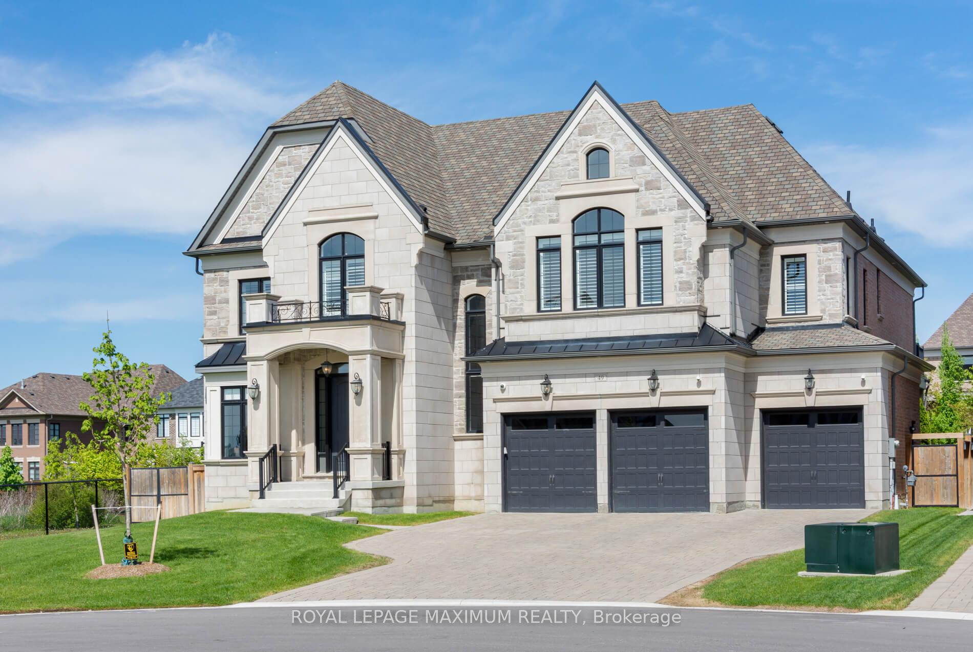 49 Mary Natasha Court Vaughan, Ontario Welcome To This Breathtaking Estate Located On A Quiet, Exclusive Court In The Prestigious Village Of Kleinburg. Siding Onto A Serene And Private Ravine, This Exceptional Detached 2-Storey Home Combines Elegance, Comfort, And High-End Finishes In A Peaceful Natural Setting. The Gourmet Kitchen Is A Chefs Dream, Featuring Premium Wolf & Sub-Zero Appliances, Quartz Countertops, An Oversized Undermount Sink, And A Large Centre Island W/ Breakfast Bar Seating. Extended Custom Cabinetry, Soft-Close Drawers, A Walk-In Pantry, And A Private Servery With Quartz Surfaces Ensure Both Beauty And Function. The Bright Breakfast Area Offers Expansive Views Of The Ravine And Opens Through French Doors To A Covered, Extended Loggia With Composite Deck, Perfect For Outdoor Dining And Relaxation. Spacious Family Room With Coffered Ceilings, Herringbone Flooring, A Cozy Gas Fireplace, And Wall-To-Wall French Doors That Bring The Outdoors In. Front Library Room With A Double-Sided Fireplace Flows Seamlessly Into A Formal Living Room With Soaring Ceilings And Open Sightlines To The Elegant Dining Area. Retreat To The Luxurious Primary Suite, Complete With Its Own Gas Fireplace, A Spa-Inspired 6-Piece Ensuite With Extensive Upgrades, A Custom W/I Closet, A Private Sitting Room, And A Double-Door Walk-Out To A Large Private Terrace Overlooking The Beautifully Landscaped Backyard. All Other Bedrooms Feature Private Ensuites, Ensuring Comfort And Privacy For Every Member Of The Family. A Spacious Upper-Level Great Room Overlooks The Family Room Below, Adding To The Home's Open And Airy Ambiance. Step Outside To A Professionally Landscaped And Hardscaped Backyard Oasis, Complete With An Inground Saltwater Pool And Panoramic Ravine Views, A True Retreat. Must See!!