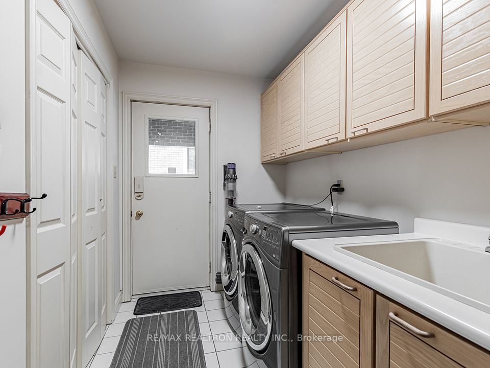 Laundry Room with access from garage and side door