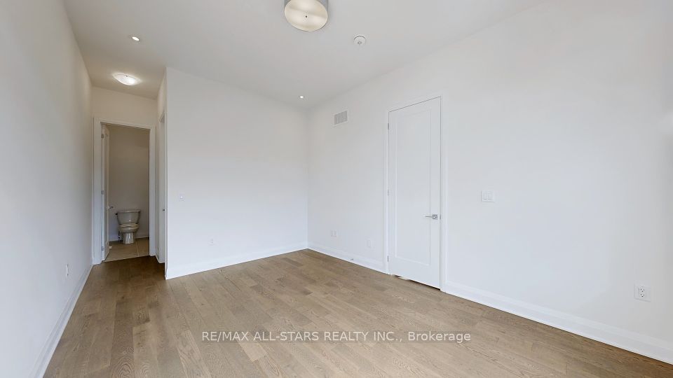 Walk in closet in primary bedroom