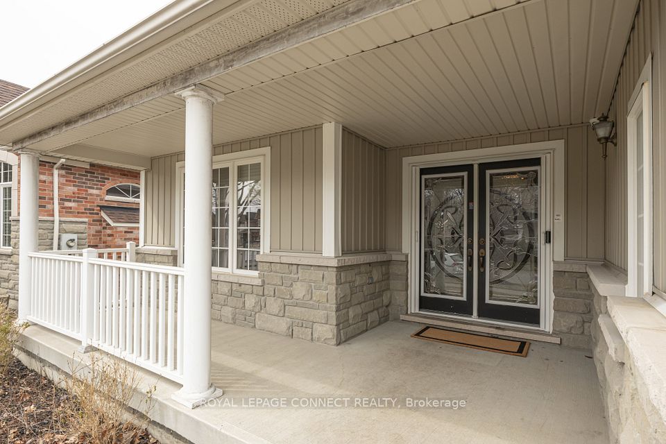 Front porch faces east. Double bevelled glass door
