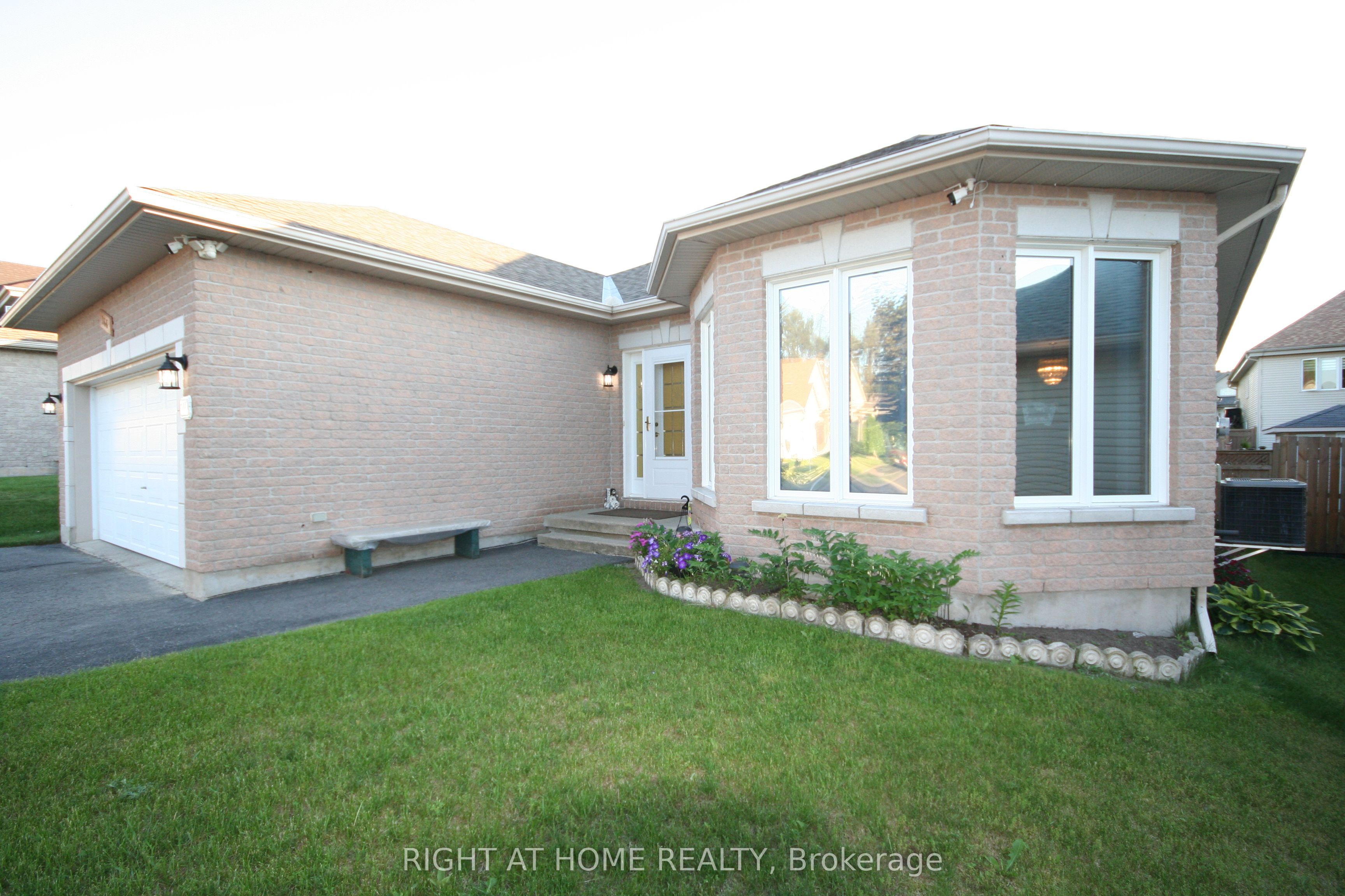 144 Sandra Crescent Clarence-Rockland, Ontario Bright and spacious bungalow close to the Rockland Golf Club! Large foyer at entrance opens up to vast living and dining room area that's perfect for entertaining! A bright and sunny eat-in kitchen has tons of storage and counter space, and looks onto a sunny, fully-fenced backyard with a well-built shed and impressive 16x10 wood/vinyl covered patio and deck! The main level features 3-spacious bedrooms including a large master with walk-in-closet and 3-piece ensuite. One bedroom has been converted to accommodate a main-floor laundry however could be easily converted back if needed. Basement features tons of additional living space, including a 4th bedroom, a wet-bar area, and a handy workshop! Additional features: vinyl windows, alarm system, 2023 HWT (owned), 2-car garage (with custom 'mezzanine' for extra storage), basement fridge, parking for 6 cars, water-filtration system, 10 wooden planters, and walk-in/accessible tub.