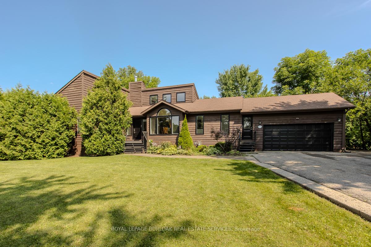 11 Weneil Drive Hamilton, Ontario Fantastic bungalow in Flamborough West on a premium corner lot! Nestled on almost 2 acres of lush greenery, this property offers unparalleled privacy and tranquility. Enjoy the convenience of nearby parks, school bus routes, and easy access to Freelton and Aberfoyle antique markets, ice rinks, tennis courts, Hwy 401, Hwy 5, QEW, Guelph, Cambridge, and Carlisle. This charming home boasts a double garage with inside entry and a driveway that accommodates up to 10 cars. The beautiful front garden features perennials and mature trees, while the fully fenced rear yard includes a solar-heated on-ground pool with a wrap-around raised deck (2021), a shed, and scenic green space views. Inside, find 3 plus 2 bedrooms plus an exercise room that could be converted into a bedroom. Enjoy new (2025) flooring that has been installed on the main and lower levels and the open concept living area, featuring a new (2025) eat-in kitchen with custom cabinetry, stainless steel appliances, and a reverse osmosis system with icemaker. The great room impresses with high ceilings, a wood-burning fireplace, and meticulously maintained hardwood floors. The primary bedroom is a serene retreat with a renovated (2025) 4pc ensuite with standalone tub, stand up shower and skylights that fill the space with natural light. The fully finished basement includes a large open recreation/family room with plenty of space for a pool table and TV or movie area. Basement also includes ample storage space, and a 2pc bathroom. Extras include a water softener, pool liner (2021), solar heating/pump (2021), Water tank (2024), Sump pump (2023), water filtration system on both levels and pool vacuum and ladder. This property is a must-see!