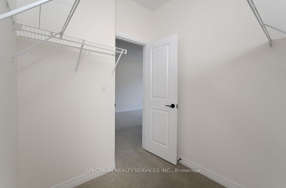 Primary Bedroom Walk-in Closet