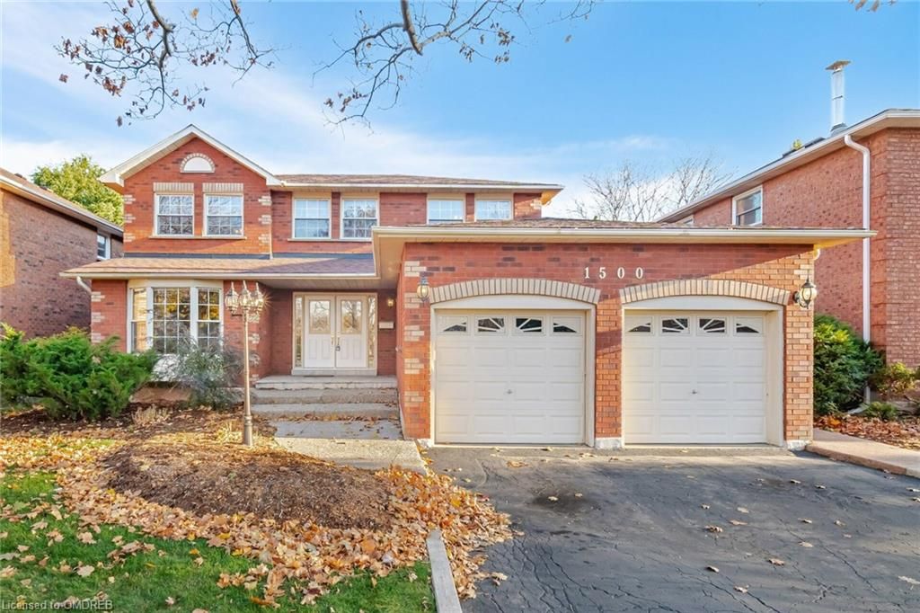 Front of property featuring a garage