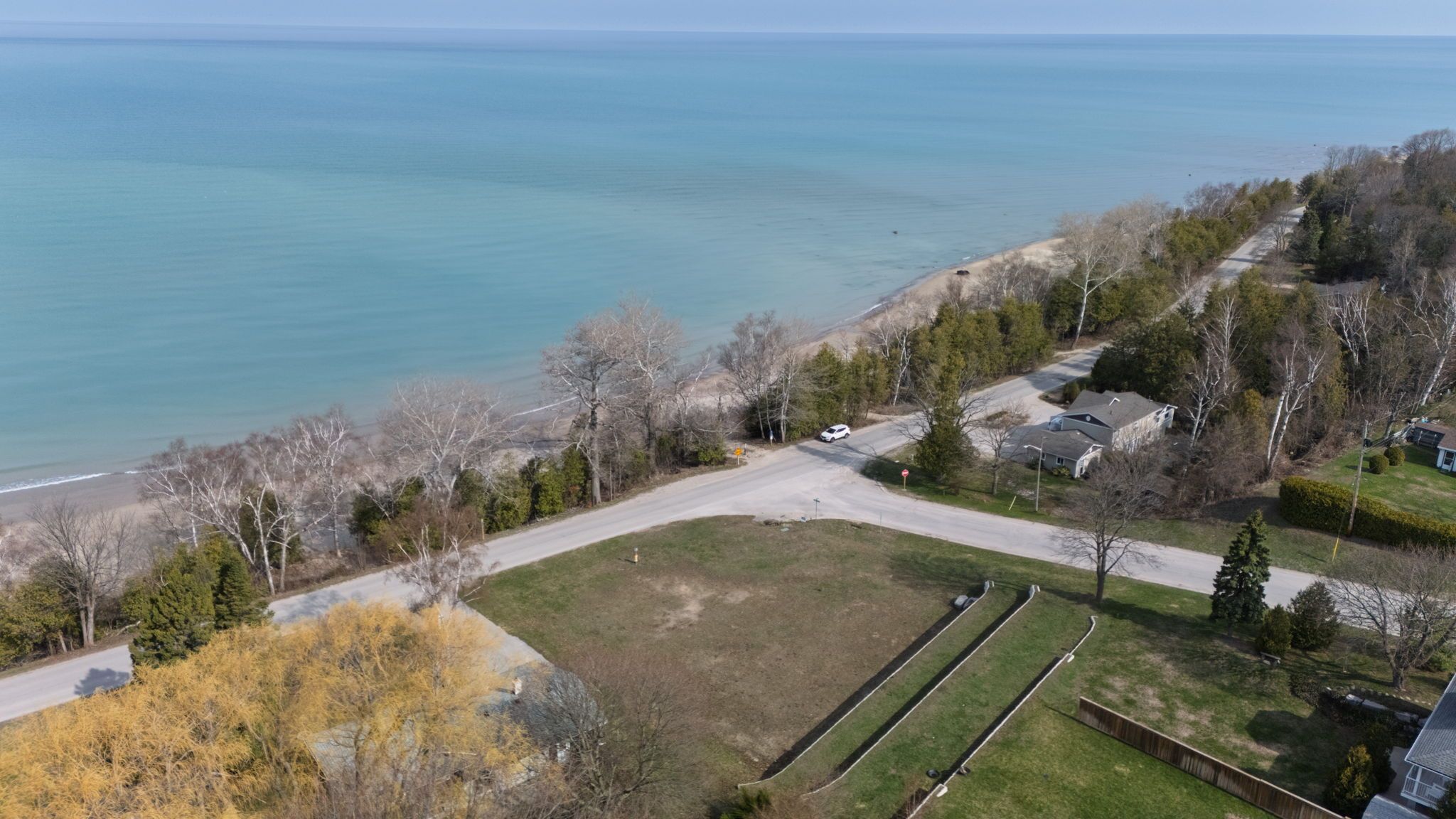 Build your dream home on this stunning vacant lot, ideally located just steps from the breathtaking beaches of Lake Huron. Enjoy world-famous sunsets and the soothing sound of the waves from the comfort of your own future home. This cleared lot features an extensive engineered retaining wall already in place, providing both value and peace of mind. Just 5 minutes from the vibrant town of Kincardine, youll be close to parks, golf courses, and scenic walking trails making it the perfect location for both relaxation and recreation. A lot survey with a proposed house footprint is available, offering a head start on planning your lakeside retreat. Don't miss your chance to own a slice of paradise! Buyer to do his/her own due diligence regarding zoning, planning and building regulations to their sole discretion and satisfaction.