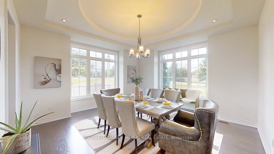 Formal Dining with Tray Ceiling & Pot Lights