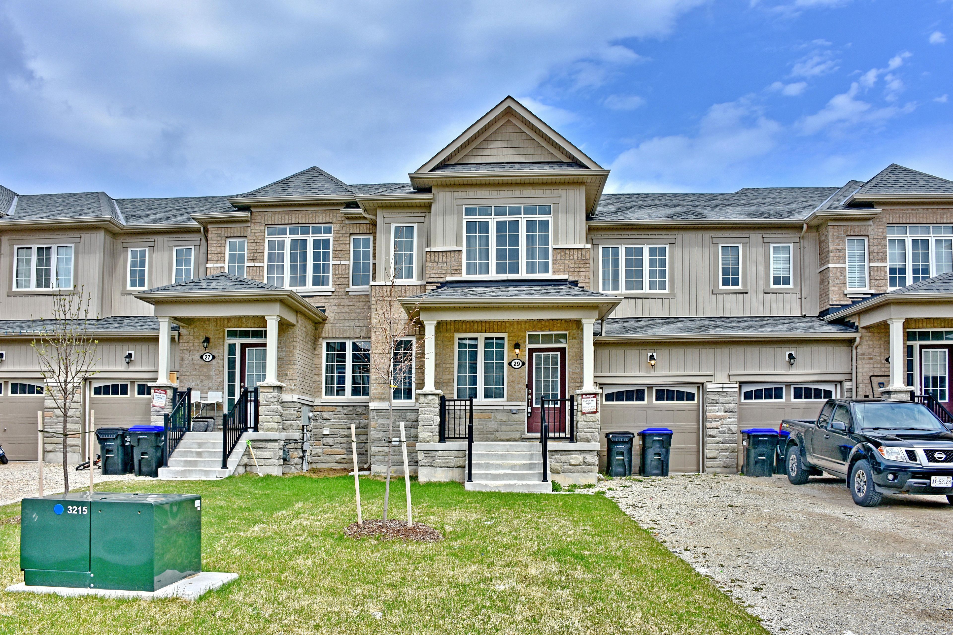 29 Stately Drive Wasaga Beach, Ontario This beautifully maintained townhome features an open-concept main floor with laminate flooringthroughout, a spacious primary bedroom with 4-piece ensuite and walk-in closet, and a basementroughed-in for a future bathroom. Located in a quiet, family-friendly neighbourhood just a4-minute walk from Wasaga Beach Public School (with French Immersion), it's perfect forfamilies or those looking to downsize. Enjoy a peaceful lifestyle away from the GTA withquality schools nearby.