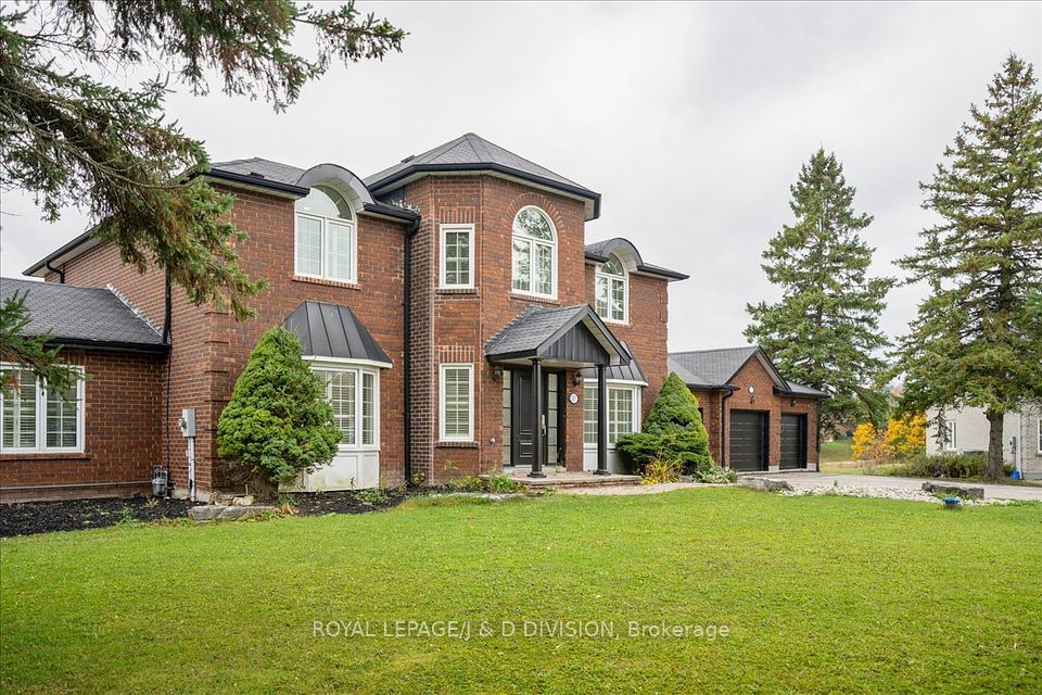 3 car garage with separate doors, access to house