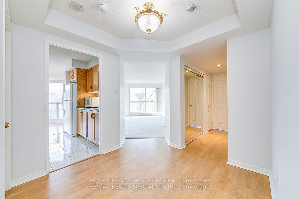 Foyer To Kitchen, Living Space And Hallway