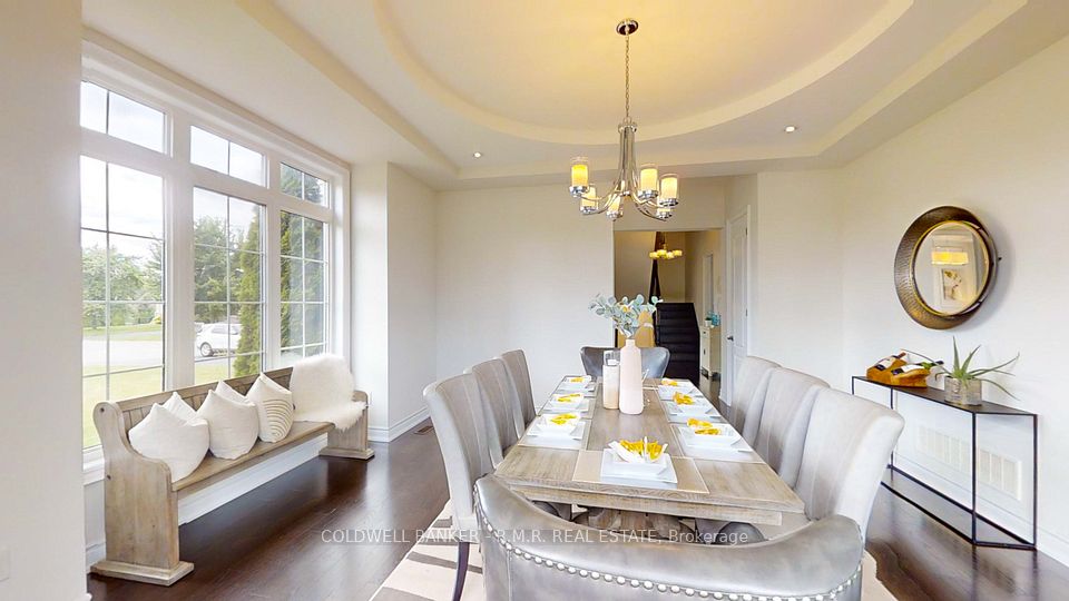 Formal Dining room With Large Windows 