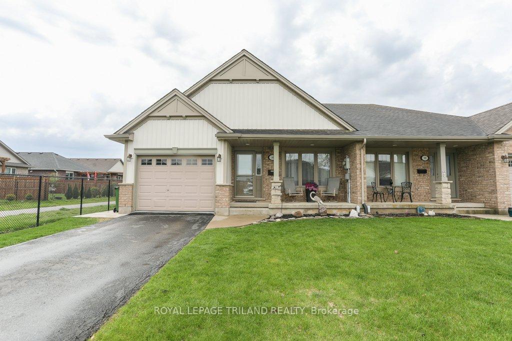 40 Pear Tree Avenue Central Elgin, Ontario Charming Semi-Detached Bungalow in a Prime Location. Welcome to this beautifully updated 2+1 bedroom, 2.5 bathroom semi-detached bungalow, perfectly situated in one of the most desirable neighbourhoods just a short walk to Mitchell Hepburn School and close to shopping, parks, and amenities. Step inside to discover a brand new kitchen (installed December 2024), featuring quartz countertops, a gas stove, pantry, and a convenient sweep vac pan connected to the central vacuum systema dream for anyone who loves to cook or entertain. The open-concept layout flows into the living room with vaulted ceilings and a cozy fireplace, creating a bright and welcoming space. Sliding patio doors lead to a private deck with a gazebo, overlooking the fully landscaped backyard with a garden shed ideal for relaxing or entertaining. The main floor offers thoughtful layout and convenience with main floor laundry located beside the primary bedroom, which includes a walk-through closet and a spacious ensuite with dual hallway access. The second bedroom also impresses with a walk-in closet, perfect for guests or family. Downstairs, the fully finished lower level features a large family room with fireplace, a full bedroom and bathroom, making it ideal for visitors, extended family, or extra living space. Additional highlights include a single-car garage, premium finishes, and exceptional curb appeal. This move-in ready home offers comfort, functionality, and style in a family-friendly neighbourhood with everything you need close by.
