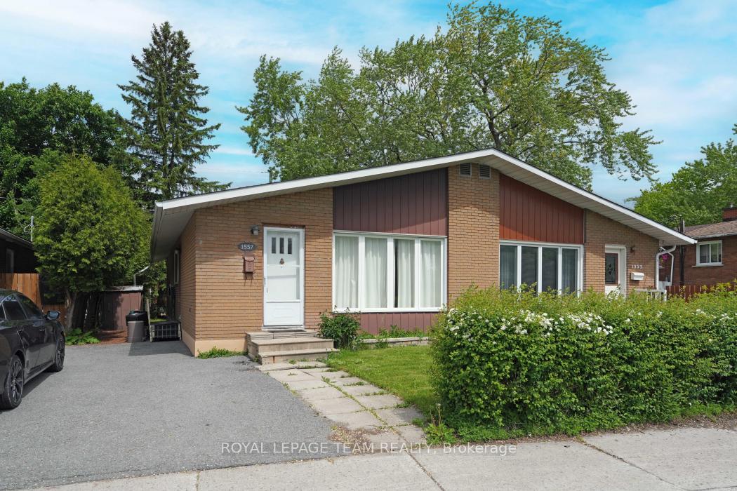 Perfect for investors or first-time buyers looking to get into the market, this spacious 3-bedroom semi-detached bungalow is brimming with potential. With quick access to transit and just minutes from both Algonquin College and Carleton University, the location is hard to beat.The main level features hardwood floors and three generously sized bedrooms. The living room is bright and welcoming, thanks to a large front window that fills the space with natural light. The kitchen offers ample cabinet space and a convenient side entry. All appliances are included, with a newer stove, washer, and dryer providing added value. Downstairs, the large partially finished basement offers additional living space and plenty of storage options. Recent updates include a multi-zone heat pump, new water heater, and upgraded attic insulation. Outside, the large, private yard provides excellent outdoor space with lots of room to relax or entertain. With solid bones and plenty of character, this home is ready for its next chapter.