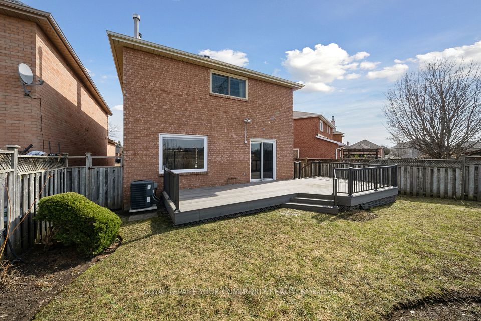 Sunny and private yard for large gatherings.
