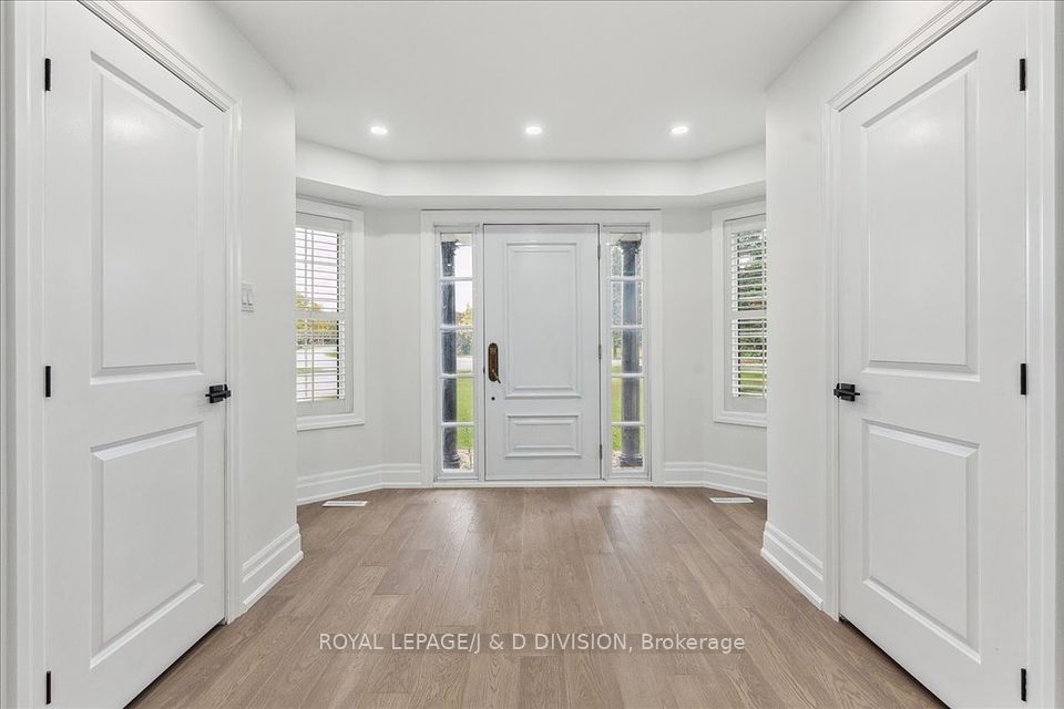 2 front hall closets, sidelights, 2 windows