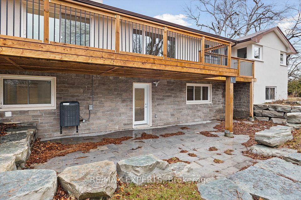 Above Grade Lower Level Opens to Stone Patio