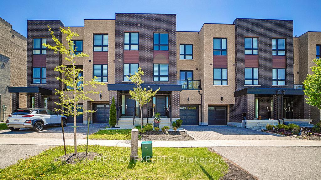 89 Gridiron Gate Vaughan, Ontario Welcome to this one of a kind, luxurious freehold, over 2300 sqft townhouse! Offering modern elegance, high-end finishings, and an unbeatable location. Features 4+1 bedroom and 4 bathrooms, this fully upgraded home boasts an open-concept layout, 9 ft smooth ceilings throughout, modern kitchen with 9 ft quartz countertop, high-end appliances, elegant dark hardwood floors, oversize windows bringing in abundant natural light creating a bright and inviting atmosphere. Many changes and lots of money spent in upgrades like the change to the spacious foyer, iron railing on the stairs, many pot lights, hardwood floors throughout, rough in bath in the finished basement, large bedroom, main floor separate kitchen server and large pantry. Expensive window coverings throughout. Expensive light fixtures on main floor. Make use of the added space of a fully finished basement, perfect for a home office, recreation, lounge or a guest suite. Steps to shopping centres, banks, restaurants, parks, public transit, Highway 400, short distance to a new mega hospital. This home has it all! Sophistication and convenience, including quiet location. Make this luxury townhouse yours in one of Woodbridge's most sought-after areas. **View virtual tour**