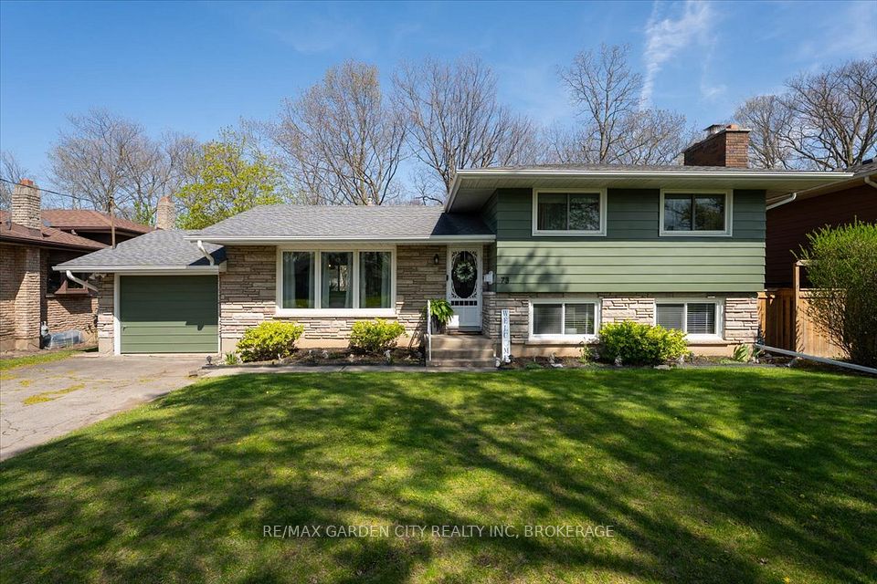 73 Alexandra Boulevard St. Catharines, Ontario Beautifully Updated 4-Bedroom Side-Split in Prime St. Catharines Neighbourhood Welcome to this spacious and tastefully updated 3+1 bedroom, 2+ bathroom home, nestled in one of St. Catharines most desirable neighbourhoods. Set on a generous lot that backs onto a serene wooded area, this property offers natural privacy and a peaceful backyard retreat.Inside, youll find numerous updates throughout, including new flooring, windows, a modernized kitchen, and patio doors that open to a bright and airy outdoor living space. Enjoy entertaining or relaxing on the beautiful raised deck or step down to a large concrete patio, perfect for enjoying the tranquil surroundings.The lower level is partially finished, featuring a bedroom, bathroom, and spacious rec room, along with a separate entranceideal for creating an in-law suite or accessory dwelling unit with income potential.Whether you're looking for a family-friendly home, multi-generational living, or an investment opportunity, this property has it all.