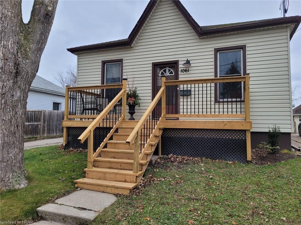 View of front of house with a front lawn
