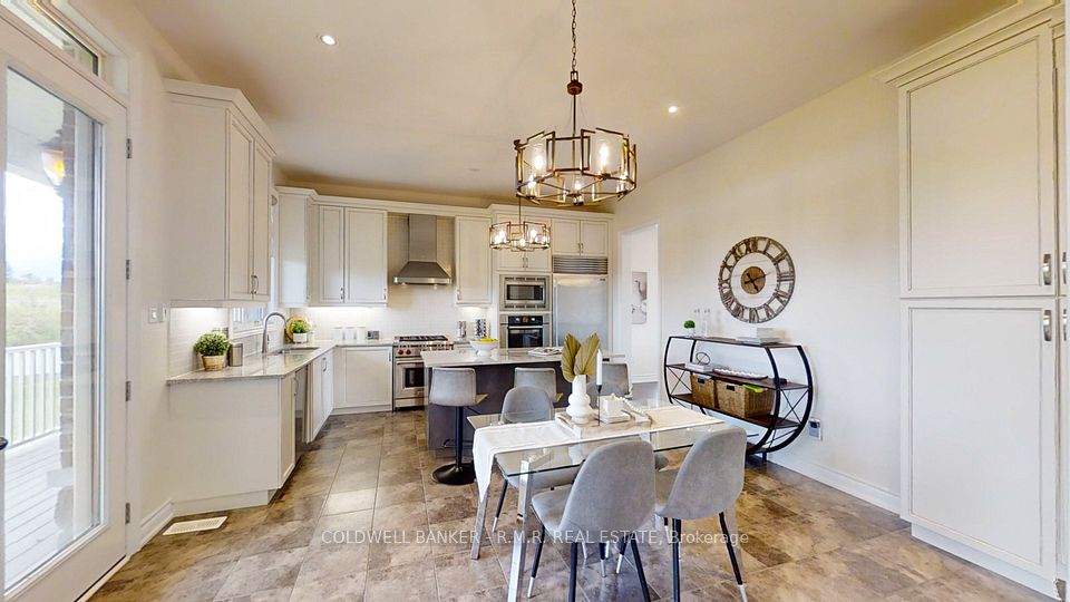 Open Concept Gourmet Kitchen With Breakfast Area