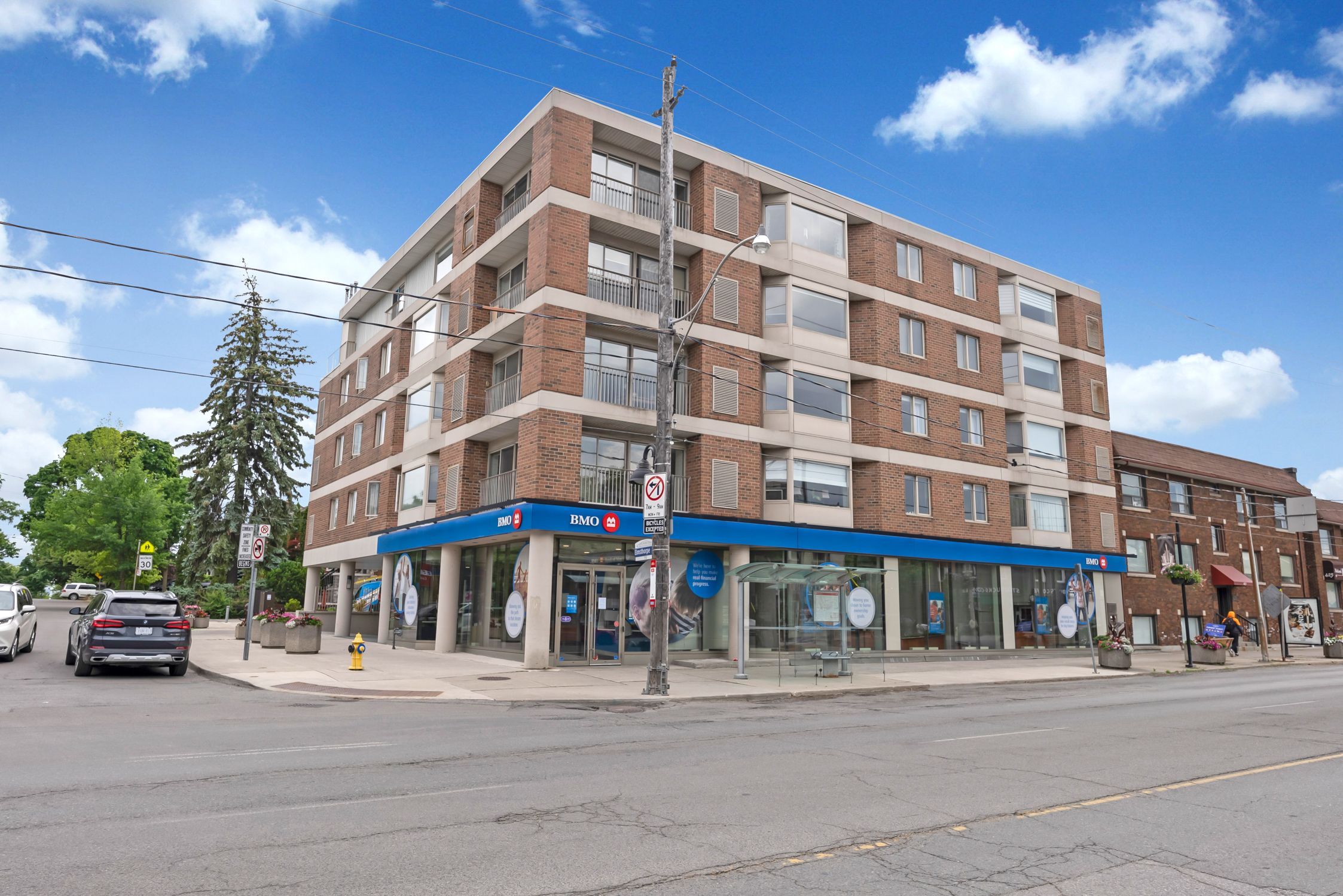 Welcome home to this spacious 1366 sq ft 2 Bedroom 2 Bathroom condo in the highly sought after Forest Hill Neighbourhood. The unit features a functional open concept floorplan with a big entry foyer, large kitchen with granite countertops, breakfast bar, and sleek slate floors overlooking the dining room and living room. Other features include hardwood parquet floors, a cozy gas stacked stone fireplace, and huge windows. Primary bedroom includes a 4 piece ensuite and dual closets. Enter the 2nd bedroom through french doors, and features a large window and double closet. Steps to all amenities, shops, grocery, transit, the iconic Phipps Bakery and Eglinton Grand, and much more!