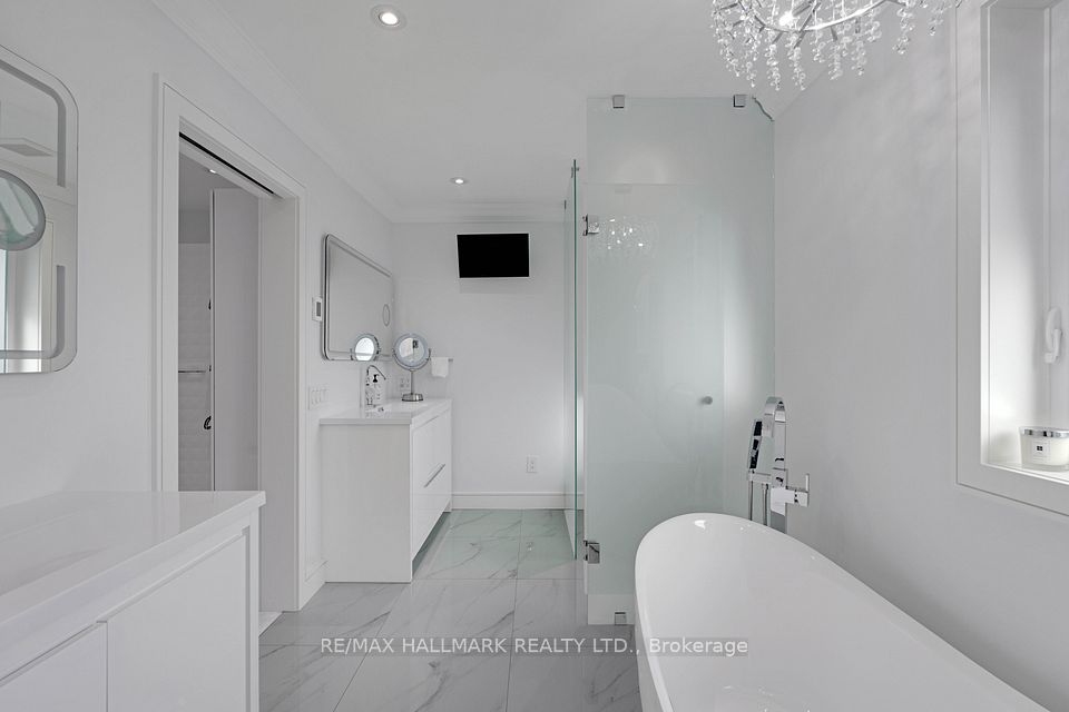 Primary ensuite bath mirrors with touch lighting