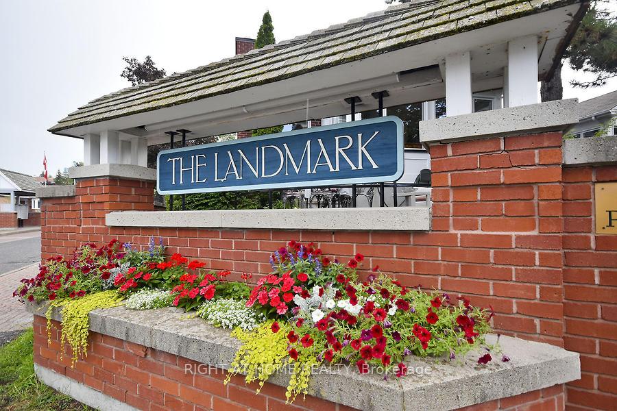 Welcome to the Landmark, your new abode nestled in one of the best community in Ottawa. A private enclave of luxury apartments with all the amenities that include salt water pool, tennis and pickleball courts, community center, walking trails and more. For residents downsizing to this lifestyle, it is  the perfect home for the next chapter of your life. A community that has social activities to keep you busy with likeminded people who enjoy being active and mingling with other residents. This two bedroom plus den faces north east and  feature 9 feet ceilings, ensuite bath and in unit laundry just to name a few. Hardwood floors are in excellent shape and ceiling to floor windows to let the sun shine in everywhere. Two patio doors from the kitchen and primary bedroom exit unto an 18x20 foot balcony with a bbq hookup for your entertainment pleasure. Virtual staging in some rooms. Walking distance to the Metro plaza and minutes drive to South Keys shopping center. Airport is only 6 minutes away and 5 minutes to McCarthy Woods with natural beauty and trails. So if you are looking to buy more than brick and mortar, this is the place. Discriminating buyers looking for more than bricks and mortar: a true village with great neighbours and a sense of belonging.