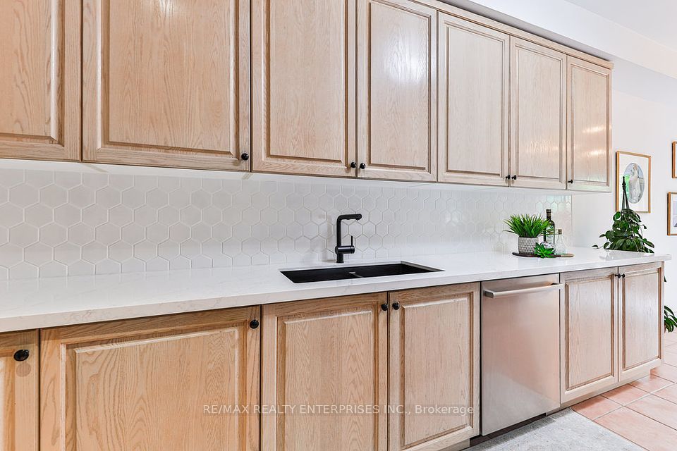 Quartz Countertops, Hexagonal Tile Backsplash